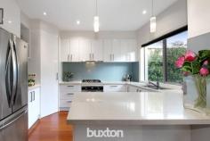  34 Teddington Road Hampton VIC 3188 $1,500,000-$1,520,000 Up-size your Bayside lifestyle in entertaining style. Scaled up with expansive proportions and entertaining spaces, this three bedroom, 2.5 bathroom streetfront home unfolds with two free-flowing living areas (each with their own gas-fire) wrapping a carefree courtyard, and a huge balconied treetop lounge - easily re-configured to sacrifice a little space and provide a fourth bedroom. Offering the great ground-floor master-suite that down-sizers and growing families want, and the pergola-covered bi-fold-wrapped al fresco area that entertainers love, this up-scale home is big on extras too; with stone-benchtops (everywhere from the prestige Blanco appliance kitchen, to the large laundry), floor-to-ceiling tiling (for private ensuite and big main bathroom) and designer detail including hard-wearing bamboo floors, privacy-enhancing e-screen and block-out blinds, and a sleek freestanding bath. Centrally heated with reverse-cycle air-conditioning where it counts and ducted vacuum throughout, the home is secured by alarm, video-intercom and 4-camera CCTV and made extra energy-efficient by 3.5KW solar panels and 5000L underground water storage. Even the car accommodation is up-sized with a double auto-garage plus parking on an exposed aggregate drive! A minute to Hampton’s latte strip and station with Haileybury and St Leonards within a walk, all the other schools in reach and the bay within a jog, this up-scale entertainer will up-size your lifestyle. 