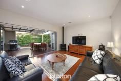  34 Teddington Road Hampton VIC 3188 $1,500,000-$1,520,000 Up-size your Bayside lifestyle in entertaining style. Scaled up with expansive proportions and entertaining spaces, this three bedroom, 2.5 bathroom streetfront home unfolds with two free-flowing living areas (each with their own gas-fire) wrapping a carefree courtyard, and a huge balconied treetop lounge - easily re-configured to sacrifice a little space and provide a fourth bedroom. Offering the great ground-floor master-suite that down-sizers and growing families want, and the pergola-covered bi-fold-wrapped al fresco area that entertainers love, this up-scale home is big on extras too; with stone-benchtops (everywhere from the prestige Blanco appliance kitchen, to the large laundry), floor-to-ceiling tiling (for private ensuite and big main bathroom) and designer detail including hard-wearing bamboo floors, privacy-enhancing e-screen and block-out blinds, and a sleek freestanding bath. Centrally heated with reverse-cycle air-conditioning where it counts and ducted vacuum throughout, the home is secured by alarm, video-intercom and 4-camera CCTV and made extra energy-efficient by 3.5KW solar panels and 5000L underground water storage. Even the car accommodation is up-sized with a double auto-garage plus parking on an exposed aggregate drive! A minute to Hampton’s latte strip and station with Haileybury and St Leonards within a walk, all the other schools in reach and the bay within a jog, this up-scale entertainer will up-size your lifestyle. 