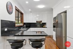  32 Shaws Cl Boambee East NSW 2452 $619,000 - $649,000 This large family home is more than adequate for all the tribe and a delight to inspect. From the moment you enter the property you are enveloped by the beautifully tended garden that creates a private sanctuary to come home to. A hedge screens the home from view & immediately makes you feel like you are in your own private world. Driving down the full length of the driveway will take you straight into the fully fenced back yard. Those needing accommodation for extra vehicles will appreciate the setup & space that's been created, complete with workshop area. Cooks will love the beautifully appointed kitchen, complete with quality appliances & black stone bench tops. Both formal & informal living zones give everyone their own space to do their own thing. The whole family will love the private & inviting in-ground salt water pool. A third bathroom is conveniently located downstairs, adjacent to the pool & entertainment area. Wrap around verandahs provide year round space for relaxation, entertainment & kids to play. Situated in a quiet street with no through traffic & green reserve at the rear, you would hardly know you are in suburbia. With so much on offer here, you will need to view this property to appreciate all that's here.. 