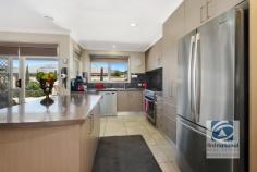  26 Barnawartha Howlong Road Barnawartha VIC 3688 $435,000 Have you always pictured yourself in an idyllic, friendly country town, where everyone is always happy to have a chat? Where the whole village keeps a look out for each other and the kids can ride their bikes safely to and from friends' houses? 26 Howlong Road, Barnawartha is located just 20 minutes from Wodonga and presents as a peaceful, safe, family haven. Set on a great block of 891m², this home is approx. 26sq under roof. The entrance to the home leads straight to a formal lounge room which flows onto the informal family area, ensuring the kids can relax in their own space while the adults unwind from the day. This is a genuine family home which showcases four bedrooms, the master bedroom featuring a large walk in robe, ensuite and its own private courtyard. The remaining three bedrooms all have built in robes, with access to a generous full bathroom with separate toilet. The open plan kitchen, family and dining areas, ensure there is plenty of space for the whole family. The sleek and modern kitchen is sure to impress the family cook with plenty of storage, dishwasher, gas cook top and island bench. Ducted heating and cooling with the addition of ceiling fans in all bedrooms will make sure that the whole family is comfortable all year round. The large undercover outdoor entertaining area is a great space for children to play and even has it's own wood heater to guarantee it is usable all year round. Additional features to note include a double lock up garage, rear yard access for a caravan, boat or trailer, a 4kw solar system with 18 panels, an irrigation system for the garden, pool fencing between the outdoor living and the lush grass of the back yard, a fire pit area for entertaining and two garden sheds on cement slabs. We cant wait to introduce this home to its' new owner! Check out the open house times or call us for a private inspection today... 