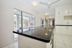  141 Telecom Road Bellenden Ker QLD 4871 50 km south of Cairns at the base of Queensland's second largest mountain, the Bellenden Ker range. Set on 13.86 hectares and nestled within picturesque farmland, you'll find this gracious 6 bedroom, 4 bathroom, double story solid block home, offering everything a modern home should. There's a double lock-up garage, security screens and split air conditioning. The very spacious master bedroom includes an ensuite bathroom with tiled floor to ceiling, a spa, separate shower, double vanity and walk in robe. There are 2 more downstairs bedrooms, one with ensuite, both with built-in robes, a large semi open dining and lounge plus the modern kitchen with granite benchtop and stainless steel appliances. In the north wing and taking up this whole side, is the massive entertaining area with included billiard table and bar. As you continue up the grand staircase, this leads you through to a spacious landing before continuing onto another 3 bedrooms and bathroom. There is then a full-length patio overlooking the rear entertaining area, with views of the in-ground swimming pool. The horse walking carousel can be seen to the right. You don't have to worry about bringing dirt into the house as there is an outside bathroom backing onto the garage. Walking around the property, you will find 20 fully enclosed paddocks coved in specialised humidicola grazing grasses, most with their own individual shelters. Numerous well-established fruit trees, plus an open plan workshop connect to multiple livestock holding pens. The owners will even include with the sale their tractor with bucket, backhoe and slasher attachments. You may be even lucky to catch a glance of the local platypus playing in the creek situated on the property boundary. This creek has crystal clear fresh water running through it all year round, and the current owner holds a permit to draw from it. If this isn't enough, the boat ramp on the Russel River is only over the highway. This river gives access to one of the natural 7 wonders of the world, the Great Barrier Reef. This home really does have it all, don't let your dream pass you by. For a viewing book an appointment today. 