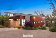  5A Merilyn Way Frankston South VIC 3199 $2,300,000-$2,530,000 Architecturally designed to optimise expansive views to Westernport, this breathtaking 5-bedroom residence effortlessly incorporates family functionality with a stunning use of natural elements. Rammed earth & Spotted Gum are standout features - combined with soaring ceilings and vast amounts of glass, this incredible family showstopper will quite literally take your breath away. Privately positioned at the end of a long driveway on approx. 2684sqm, auto gates open to reveal a truly spectacular home - step inside, and its interiors will instantly surpass all expectations. From the entrance hall, the views are immediately evident – whether reclining in the awe-inspiring living/dining area with suspended fireplace, or preparing meals in the state-of-the-art Miele kitchen, the home’s elevated position above the Peninsula will always impress. An HIA-award-winning bathroom with decadent freestanding bath stars in the master retreat which also enjoys sweeping vistas of the region. A guest bedroom with ensuite is also located on this level whilst three more bedrooms, a lounge area and family bathroom are all separately zoned – perfect for kids or extended family members. With a host of luxury inclusions only a visit will uncover, among the highlights are jaw-dropping infinity edge pool, outdoor kitchen, automated blinds, ducted vac, zoned heating/cooling, home office, Sonos sound, wine cellar, comprehensive security, aquarium and double auto garage. The home also benefits from incredible amounts of storage throughout. In a peaceful low-traffic cul-de-sac – this really is a once in a lifetime opportunity. 