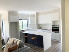 2/60 Kinchela Avenue Toormina NSW 2452 $500,000 - $520,000 This brand new luxury townhouse is a benchmark in quality and design. Comprising of two levels and situated only minutes to the local shops, doctors and the beautiful Sawtell beaches, this home is architecturally designed around modern family life. Enjoy a stunning gourmet kitchen with stone benchtops and quality appliances, this central hub of the home adjoins a spacious lounge/dining space that opens out onto a breezy alfresco area which offers another living space to retreat to. There are 2 generous bedrooms, the main opening out onto a private balcony and has an adjoining luxury bathroom with freestanding bath tub and high-end fittings. This immaculate and elegant townhouse is perfectly suited for those looking to downsize and still maintain a luxury lifestyle. Call Cheryl today on 0412 675 240 for an inspection of this great property. 