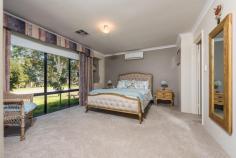  57 Carosa Rd Ashby WA 6065 $500,000 Welcome to 57 Carosa road in beautiful Ashby, this outstanding 5 bedroom family home has all the extras for a growing family , set on a massive 648m2 block overlooking a beautiful park and with 234m2 of living to enjoy this truly is a home that will suit any buyer. - Internal features !! - Expansive master suite with modern ensuite that inc double vanity & large shower - large walk in robe with built in units in master bedroom - Quality blockout blinds and window treatments - Tinted windows to the front - Formal lounge with beautiful park aspect - Spacious open plan living and dining with large games room overlooking the garden - Gourmet kitchen with soft close drawers , Bosch stainless steel appliances. - Stone benchtop and glass splashback to kitchen - Generous queen / king bedrooms with built in robes ideal size for teenagers - Bedroom 5 is ideal as a nursery as its positioned beside the master bedroom - laundry with ample storage and separate wc - Family bathroom with shower , bath and vanity - Activity room / office between bedroom 3 & 4 - Daikin ducted air conditioner - Split system to master bedroom - Outside features !! - 12 Solar panels with a 2.28KW inverter - Mains gas BBQ - 2 outside gas bayonets - Alfresco blinds - Paved driveway and double remote garage - Manicured landscaped front and back garden with stunning water feature - Large al fresco area ideal for large family get togethers - Room for a pool is needed or just enjoy the landscaped garden. - Fully reticulated - Alarm system There is so much to see in this beautiful home so don't hesitate to contact me on 0406163078 for your private viewing if you can't attend home open . 