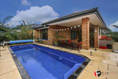  77 Spring Hill Tapping WA 6065 $520,000 A great sized 4 bedroom with 2 well appointed bathrooms will be available to view in the next week. The home offers a large home theatre, study, open plan tiled living areas, games room and much more. The large kitchen with 900mm cook top and oven, large walk in pantry and island bench with breakfast bar overlooks the lounge and dining area which open out to the Alfresco area tidy  and swimming pool area. This is a great sized home will suit a large family and feature a great overlook to the bushlands and walking distance to the local school.  This home also features: Reverse cycle ducted air conditioning 18 panel 3.6kw solar power system, to help save on your Electricity bill Gas boosted, solar hot water system Parent’s courtyard which leads out from the Master Bedroom Kitchen comes with 900mm appliances and dishwasher Extensive Liquid Limestone paving Tiled living area Home Theatre Study Features in-Ground Pool Close to school Theatre room activity room Study Ducted air conditioning.. 