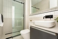  2/62 Smith Street Kensington VIC 3031 Immerse yourself in this brand new luxurious living with this brand new three bedroom/three bathroom townhouse superbly positioned 4.5km from the CBD and just walking distance to Newmarket Plaza, Kensington Village, Flemington Racecourse and a choice of train stations. Immediately impressive, the homes bold architectural design begins with a sleek and striking façade, alluding to the quality, sophistication and style that feature within. North facing living domain and sublime gourmet kitchen delivers seamless flow and reveal a gas Miele cooktop, oven, undermount rangehood and dishwasher plus lustrous stone lined counters and ample cabinetry. Three lavish bathrooms, two being ensuites, service the residences three bedrooms, all with BIRs. Discover true urban excellence for yourself and reap the benefits of city fringe living. 