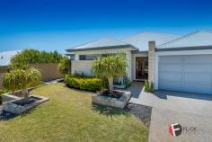  3 Malvern Rd Butler WA 6036 $519,000 - $539,000 This Home presents immaculately and has all the additional extras you expect from an ex display home offering the best of both worlds and in a great location close to local amenities schools and the beautiful Eden beach only a short stroll away, there's nothing for you to do but unpack,relax and enjoy, it truly has something for the whole family. Upon entry through a large feature glass front door you will be greeted by a impressive entrance hallway with 34c feature ceilings and modern coving. The master bedroom with its soaring high ceilings feels like a resort,from the spacious walk in robe to the expansive ensuite with double vanity and stone bench top to the large double shower and separate bath. Just off the hallway and through the double glass door is the theatre room,the perfect haven after a long week to relax and watch a movie with the whole family. The stylish and contemporary kitchen is the hub of this home with 20mm stone benchtop to the waterfall edge on the breakfast bar ,top quality appliances and large walk in pantry complement this expansive kitchen , the adjoining living and dining area opens out to the manicured garden and undercover al fresco ,making it perfect for entertaining. To the rear of the property is the well appointed 3 remaining bedrooms with stylish window treatments and double frosted sliding robes, you will also find the study area or activity area for the kids to hangout with friends. The main bathroom is complete with shower ,vanity and bath and there even a powder room for guests, you will also find the laundry room with ample storage ,long benchtop and floor to ceiling sliding linen robe. OTHER FEATURES Front entry porch with high ceiling to hallway 34c ceilings to Hallway and master bedroom Feature ceiling to theatre room with double glass doors Contemporary coving throughout Quality stainless steel appliances Large walk in pantry Soft close drawers 20mm stone bench tops to kitchen with waterfall edge to breakfast bar Quality blinds and voile Chrome downlights throughout Clipsal slimline light and power points throughout Daikin air conditioner zoned Alarm system Double remote garage Undercover alfresco Reticulated front and rear gardens and so much more !!! 