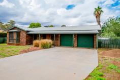  18 Hellyer Court Dubbo NSW 2830 $429,000 - $449,000 Located on a large block in a quiet cul-de-sac in a great East Dubbo locale, here is an awesome opportunity for a growing family to purchase a wonderful spacious home with a great floorplan. This large sized light and airy home will suit the growing family. All bedrooms have built-ins, with an ensuite to the main bedroom and you will even find a huge corner spa in the main bathroom. The home also has a great sized laundry. The open plan kitchen and family room is enormous plus there is a separate living room with its own bar ideal for entertaining. With plenty of space for the whole family to enjoy inside, you can then step outside to the impressive entertaining area boasting a sparkling salt water pool to cool off during these warm summer months. With easy to maintain gardens, side access to the property, a large garden shed and the double garage with outside access, you will have ample space for all your toys. You can even retreat to your own “zen” garden complete with water feature to reflect about how great this home is for your family. – 930 sq m block – 4 Bedrooms with built-ins – Ensuite to Main – Corner Spa Bath – Huge Living Areas – Evap Air-Conditioner – Gas Hot Water & Heating – Entertaining Area – Salt water Pool Contact Trent at Dotcom Dubbo Property Sales to arrange a private inspection... 