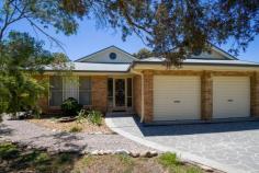  4 Betula Gr Bundanoon NSW 2578 $650,000 This immaculate brick and colour bond Beechwood home feels and looks brand new from the pretty facade behind the native garden to the front entrance hall and beyond. The property has been a successful rental property for many years and has had a complete makeover ready for the lucky buyer. Freshly painted inside and out with decorative cornices plus new carpet throughout the bedrooms, rumpus and formal living space The hub of the home is the large tiled open plan family / meals area off the generous kitchen with breakfast bar, gas / electric cooking, dishwasher and direct access to the sun filled private yard A bright and airy home largely due to the neutral colour scheme and large well placed windows offering natural light and northern sunshine to the living The 4 bedrooms are all generous in size with excellent storage, the master suite having a walk in robe + modern bathroom separate to the guest / children’s wing which can easily be closed off and houses the main bathroom and laundry Heating is via gas points to the living areas and the attached garage with internal access adds to the ease of living in this home + external garden shed The rear yard is well fenced and somewhat of a blank canvas with large level lawn area to the rear just awaiting your green thumb. Directly off the kitchen / family room, there is a perfect space to create the ultimate deck or terraced area for outdoor entertaining. Fabulous cul-de-sac location in the charming village of Bundanoon.. 