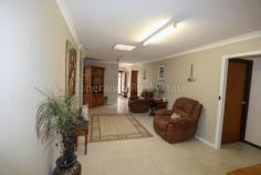  71 Goldfields Road Castletown WA 6450  $335,000 This pleasant 4 bedroom, 2 bathroom brick and tile home conveniently located near a shopping centre, service station, big park across the road and the beach is just a short stroll away. Black/White kitchen, dining & family areas, lounge and ceiling fans. Massive enclosed patio with carport and 6m x 9m powered garage/workshop. 