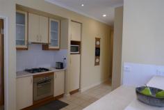  6/24 Bokhara Street LARAPINTA NT 0875 $385,000 Architecturally designed and built, this 2-bedroom, 2-bathroom, 2 car park unit, is perfectly positioned in a six-unit complex, and is unparalleled for quality, workmanship, and design. In addition to this, aspects such as privacy, security, views, close proximity to shops, schools transport, and sporting facilities, and you have the complete package. Luxury features include: —- An entrance hall that invites you inside to the spaciousness that awaits you. Large open space living area with cathedral ceilings and lots of natural light. 2 large bedrooms; the main with a walk-in robe and en suite bathroom. The second bedroom has floor to ceiling robes and is across the passageway from a fully equipped bathroom and separate toilet. Designer kitchen with gas cooking and quality appliances, adjacent to the living/dining areas, allowing the opportunity to enjoy the company of family and friends, whilst cooking up a stormgreat for entertaining. Well-appointed laundry with lots of room. Gas cooking, fully ducted air conditioning throughout, with additional split system reverse cycle cooling and heating to living area, ceiling fans and down lights, with quality blinds, curtains, and flooring, throughout. Landscaped rear courtyard area to sit, relax, and enjoy the aspect of the nearby mountain range. This is truly the one with the lot.. 