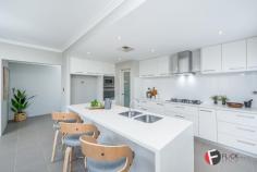  3 Malvern Rd Butler WA 6036 $519,000 - $539,000 This Home presents immaculately and has all the additional extras you expect from an ex display home offering the best of both worlds and in a great location close to local amenities schools and the beautiful Eden beach only a short stroll away, there's nothing for you to do but unpack,relax and enjoy, it truly has something for the whole family. Upon entry through a large feature glass front door you will be greeted by a impressive entrance hallway with 34c feature ceilings and modern coving. The master bedroom with its soaring high ceilings feels like a resort,from the spacious walk in robe to the expansive ensuite with double vanity and stone bench top to the large double shower and separate bath. Just off the hallway and through the double glass door is the theatre room,the perfect haven after a long week to relax and watch a movie with the whole family. The stylish and contemporary kitchen is the hub of this home with 20mm stone benchtop to the waterfall edge on the breakfast bar ,top quality appliances and large walk in pantry complement this expansive kitchen , the adjoining living and dining area opens out to the manicured garden and undercover al fresco ,making it perfect for entertaining. To the rear of the property is the well appointed 3 remaining bedrooms with stylish window treatments and double frosted sliding robes, you will also find the study area or activity area for the kids to hangout with friends. The main bathroom is complete with shower ,vanity and bath and there even a powder room for guests, you will also find the laundry room with ample storage ,long benchtop and floor to ceiling sliding linen robe. OTHER FEATURES Front entry porch with high ceiling to hallway 34c ceilings to Hallway and master bedroom Feature ceiling to theatre room with double glass doors Contemporary coving throughout Quality stainless steel appliances Large walk in pantry Soft close drawers 20mm stone bench tops to kitchen with waterfall edge to breakfast bar Quality blinds and voile Chrome downlights throughout Clipsal slimline light and power points throughout Daikin air conditioner zoned Alarm system Double remote garage Undercover alfresco Reticulated front and rear gardens and so much more !!! 