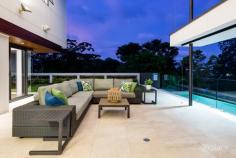  18 OWEN LANE AUCHENFLOWER QLD 4066 This private and prestigious residence spans three levels in the heart of inner-city Auchenflower and is perfect for a growing family to enjoy distinctly separate living spaces, generous bedrooms and come-together by the pool and adjoining kitchen. A spectacular void above the living and dining area, and a series of expansive floor to ceiling sliding glass doors and windows frame a seamless indoor/outdoor flow to the poolside entertaining family hub. Finished to an exceptional standard befitting the calibre of its location and outlook, this Tim Stewart Architects 'Dream Home' assures comfort and style, featuring an infinity pool, built-in BBQ, double sided indoor/outdoor fireplace, multiple living room areas and open plan design. The architectural showpiece incorporates modern elegance with functional family living and takes advantage of the optimal North East aspect. Move straight in and enjoy this wonderfully central location moments from the CBD, leading schools, shopping centres, golf courses, and Rosalie Village. Key features: - Huge 997m2 block - Wooden flooring enhances exquisite living and dining spaces - Completely level child and pet-friendly yard with established low-maintenance landscaping. - NE Aspect with City Glimpses - Retractable doors to private outdoor entertaining with fireplace - Infinity swimming pool surrounded by manicured gardens - Marble kitchen with premium inclusions including Miele oven - Five bedrooms including a superb master suite with ensuite, WIR and views - Double lockup car garage with organised storage areas - Close to quality schools and Rosalie Village plus easy access to CBD - A selection of living spaces and study areas - Spectacular void above the dining room, glass walls magnifying natural light - Warmed by a double sided indoor/outdoor combustion fireplace - Built-in barbeque and outdoor storage - Reverse-cycle air-conditioning and remote control blinds - Designer laundry with laundry chute, folding bench, sink, storage and access to drying courtyard.. 