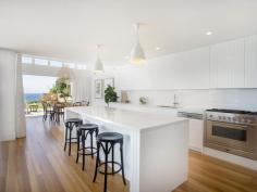  19 CALVERT PARADE NEWPORT NSW 2106 Contact agent to discuss the possibility of an inspection. Set on the oceanfront on the most exclusive street in Newport, this just completed residence redefines luxury living for the family; nestled above the beach with a sun-drenched northerly aspect, it captures the essence of relaxed sophistication and boasts a title that runs to the high watermark. This is a rare opportunity to acquire "simply the best" and enjoy one of Sydney's most coveted locations. - Designed by Dan Raymond, construction by Travers Williams - Three exquisite levels w/internal lift; endless ocean views - Open plan layout, Blackbutt floors and wainscoting throughout - Flawless interiors extend to sunlit terrace, infinity pool, bbq pavilion - Deluxe kitchen with CaesarStone island plus butlers' pantry - Indulgent master; fireplace, sitting room, designer ensuite - Total of five ensuite bedrooms plus separate built-in study - Two gas fireplaces, ducted air, workshop, charge unit for car - Full security system, laundry w/Miele appliances, guest w/c - Set in a tightly held premier oceanfront position… 