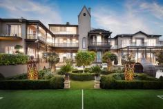 18 Shakespeare Grove Hawthorn VIC 3122 One of Melbourne’s finest mansion estate properties perched on top of the St James Park Hill with outstanding 360 degree views of Melbourne’s skyline and surrounding suburbs set in magnificent verdant botanical garden surrounds on a land size of 4249m2 approx. situated within 10 minutes from the Melbourne CBD, parklands, top private schools and transport. This elegant Victorian residence has been restored and extended with a contemporary renovation to the highest standards providing excellent indoor and outdoor entertainment facilities including 2 swimming pools, a 10 foot outdoor TV, gymnasium, 2 roof top terraces, teppanyaki bar, 10 car garaging, 18 seat cinema, 4000+ bottle wine cellar, guest suite and care takers quarters. Accommodation includes large formal lounge and separate dining, huge informal sitting room, commercial grade kitchen, 9 bedrooms, 4 ensuite bathrooms and 3 main bathrooms, library, ballroom, billiard room with 18 rooms in total. Additional features include air conditioning, heating, high grade security and integrated management system. Inspect By Appointment 