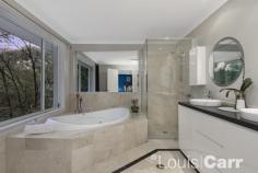  20 Sylvan Grove Glenhaven NSW 2155 $2,250,000 Nestled down a private drive on a picturesque 4,000m2 parcel of land. Enjoy the tranquil bush setting this luxurious Denton Home has to offer. This magnificent home showcases expansive formal and informal living zones extending out to an extensive covered alfresco entertaining area, huge balcony plus large deck with a swim spa. Boasting an idyllic connection to the bush and wildlife that can be appreciated from every room. Located in a family friendly pocket within minutes to local school, shops, community facilities and transport. Take the opportunity to view this lifestyle masterpiece. Property Features: • Grand entrance atrium with high ceilings greets you upon entry • Expansive formal lounge room with fireplace is situated directly off the entrance foyer • Large private Director's office with access to powder room • Centrally located chef's kitchen boasts stone benchtops, huge island bench, gas cooktop and quality stainless steel appliances • Huge sun drenched meals conservatory sits adjacent to the kitchen with an impressive bush outlook • Extensive casual living area features cosy fireplace and extends to the huge hand-made terracotta tiled balcony • Palatial master suite enjoys an extravagant marble ensuite, huge walk in robe and private balcony with tranquil bush views • Built in robes to the other three king-sized bedrooms • Italian marble family bathroom with bath and double vanity services upstairs accommodation, with a powder room conveniently located on the lower level • Multiple outdoor entertaining areas including generous covered alfresco dining with built in woodfire pizza oven and endless bush views seamlessly transitions from the indoor living • A small step up to the large entertaining deck with relaxing duo 8 seater spa and heated swim spa • Some additional features include: ducted reserve cycle air conditioning, plantation shutters, external CCTV system, solar panels, automatic triple car garage with internal access, large walk in linen cupboard, beautifully landscaped, easy care lawn and gardens and so much more… 