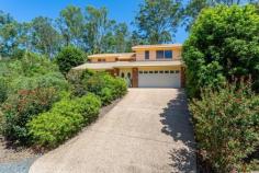  111 Clagiraba Rd Clagiraba QLD 4211 $699,000 "A VERY PRIVATE OASIS" This contempary private brick and tile home is nestled comfortably into a very special part of the Gold Coast Hinterland that boasts excellent views across the gently undulating 5.4 Acres of selectively cleared and landscaped gardens. The two story home has three bedrooms all with built in robes, master with ensuite and main bathrooms upstairs with a separate toilet the lower level. There is a spacious open plan lounge, dining and kitchen area with very appealing American Oak cabinets, an electric fan forced oven, hot plate and dish washer to complete. Benefit from the cool ceiling fans spaced throughout the home and on the warmer or cooler evening a reverse cycle split system A/C to take control of the climate. There is a good sized Entertainment/BBQ area outside, set in a quiet secluded position of the home. The welcoming front entrance double doors are a wonderful feature. The garage is fully secure with remotes to the outside doors. This property is in a great location within 10 minutes drive to the Gold Coast and Pacific Highway, and just minutes away from Parks and Schools. This property must be inspected to appreciate every special unique feature and is definitely priced to Sell. Please call John Tetlow "Principal CVRE" 0412 571 900 for a private inspection.   Airconditioning, Broadband, Built In Robes, Dishwasher, Ensuite, Fully Fenced, Grey Water System, Open Spaces, Pay TV, Remote Garage, Reverse Cycle AirCon, Rumpus Room, Secure Parking, Split System AirCon, Water Tank, Workshop, 