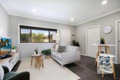  3/425 Urana Road Lavington NSW 2641 $205,000 FULLY RENOVATED & MOVE IN READY Located in a quiet street, this unit has been professionally renovated to a very high standard. Everything is done for you - the roof, facade, wiring, plumbing, kitchen, bathroom and even the outdoor area. In a complex of only three units and just 1km from the Lavington Plaza, the unit has two bright bedrooms with built in robes, a beautiful combined laundry and bathroom with great bench space, large walk in shower and plenty of storage. Open plan, light and bright, the tiled living and dining space sits adjacent to the stunning kitchen. With stone bench tops, stainless oven, gas cook top and ample storage, this kitchen won't disappoint. A split system for heating and cooling, will ensure cost efficient comfort year round. Outside, your own private courtyard is the perfect place to relax with a glass of wine and a good book. The convenience of a single lock up garage ensure your vehicle is kept safe, and has direct, private entry to the unit. To add to the privacy and security, this unit overlooks the lovely walled garden that is central to all three units, with a secure keycode entry, it's your own gated community! Strata Titled, this unit would be perfect for an owner occupier or an investor, with gross rental returns expected of 6% If you are looking for a "move in ready" unit to call home, or a fantastic investment, you have found the perfect gem! Call today to inspect… 