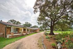  544 Peach Tree Road Megalong NSW 2785 With panoramic sweeping views of the valley and stunning escarpments this established rural property is for sale for the first time. The everchanging features of the surrounding escarpment light up red in the setting sun or can be capped by mountain mist that cascades into the valley below. In the other direction are majestic views over the adjoining valley and into the mountain ranges beyond, where you can enjoy tranquil sun rises and sunsets that only dreams are made of. Set on 10.12 ha (25 Acres) this spacious residence is designed to capture the views and is in pristine condition. It would make an ideal full time family residence or lifestyle property. 10.12 hectares (25acres) 5 spacious bedrooms 2 bathrooms 1 games room Large decking with sails and inbuilt feature lighting Large double garage with remote doors and sensor lighting Reverse cycle air conditioners Sunken lounge room with feature fireplace Satellite dish and house wired for satellite tv Gas stove Dishwasher Established garden Two water storage tanks with total capacity of 56,000 litres Spring fed dam Creek to the rear of property Property fully fenced into 4 separate paddocks Post and rail fence around house paddock, wire fencing around remainder of property One 6 bay machinery shed/workshop with a fully enclosed office Fully enclosed chook yard Small feed shed Garden shed Enclosed paved, raised bed vegetable garden Fruit trees- apricot and cherries Ideal location for a cabin exists, with majestic views looking out toward Kanangra Boyd National Park Lithgow City Council municipality The sellers have already purchased and motivated to move closer to family… 