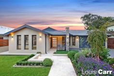  52 RIDGECROP DRIVE CASTLE HILL NSW 2154 This comprehensively renovated home offers a lifestyle of distinction in an esteemed location. Lavishly appointed with the highest attention to detail, the single level home boasts a versatile & family friendly layout plus a sensational private entertainers oasis including stunning in ground pool & spa. Presenting a fantastic opportunity to own and enjoy an immaculate family residence proudly sitting on a level 782m2 block with meticulously landscaped gardens and lawn. Ideally set within a short stroll to Knightsbridge shops, Samuel Gilbert Public and transport facilities. Property Features: • Spacious light filled formal lounge with stunning ethanol gas fire place plus separate formal dining room • Impeccable new gourmet kitchen features modern stainless steel appliances, Caesar stone bench tops with breakfast bench and an abundance of storage facilities • Generous family room sits adjacent to the kitchen and effortlessly flows to the outdoors • Huge master suite comprises of built in robes, new lavish ensuite, parents retreat and is ideally located at the front of the home • Remaining 3 double sized bedrooms all with built in robes • Flawlessly appointed is the new family bathroom enjoys frameless shower, tub and floor to ceiling tiles • Striking covered alfresco entertaining boasts timber ceiling, built in outdoor kitchen with BBQ while enjoying a tranquil rear yard outlook • Stunning in ground pool and spa with easy care surrounds • Private level grassed rear yard with a wood fired pizza oven including bench top and storage • Meticulously landscaped easy care gardens with programmed watering system and lawns surround the home • Automatic double lock up garage plus side access • Additional features include new timber planation shutters, ducted reverse cycle, security camera, solar panels, new carpets, oak timber flooring, freshly painted throughout and so much more Location Benefits: • An easy 450m walk to Samuel Gilbert Public school and in the Castle Hill High School catchment • 800m to Knightsbridge Shopping Village • Only a short 2.7km drive to Hills Showground Metro • 3.9km drive to Castle Towers shopping, dining, entertainment and transport precinct • Easy access to Fred Caterson Reserve with sporting complexes walking tracks, tennis courts, basketball stadium & BMX tracks Virtual Tour Link: https://propertylaunchtours.com/52-Ridgecrop-Dr-Castle-%20Hill/ *Every precaution has been taken to establish accuracy of this information, but does not constitute any representation by the vendor, agent or artist. 