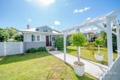  151 Alice Street Grafton NSW 2460 Alice Street is a highly sought-after area of Grafton, known for its naturally elevated position, peaceful streets and character filled homes. Here on Alice Street sits this stunning, low-set, fully renovated home boasting beautiful kerbside appeal and high-end features throughout. Nothing has been missed in this extensive renovation; the hard work put in has been well worth it as falling in love with every aspect of this home is inevitable. A white picket fence surrounding the property, gorgeous established gardens and the many period features throughout the home instantly set it apart from the others. Upon entry you walk straight into the open plan living, dining & kitchen area; offering combustion wood heating, reverse cycle air conditioning and ceiling fans. The kitchen, located toward the back of the home has been fitted with white shaker cabinets, stone benchtops, a stunning tiled splashback and a new farmhouse sink. This area showcases polished hardwood floors, ceiling roses, picture rails and period coloured glass windows. The master suite offers a spacious bedroom with built in robes, French doors to the front verandah, an ensuite with a double shower and gorgeous feature tiles. The main bathroom has the same feature tiles as the ensuite with a bath and shower. The home office is situated at the rear of the home and is separate to the house, accessed from the rear verandah providing the perfect option to work from home. As well as the rear verandah, outside offers a garden shed, an air conditioned double lock-up garage with a shower and toilet and side vehicle access to the yard. Even with all of these features, there is still plenty of room for the kids to play. To arrange your private inspection, do not hesitate to contact a Ray White agent today. FEATURES: • 	 Built-In Wardrobes • 	 Close To Schools • 	 Close To Shops • 	 Close To Transport • 	 Fireplace(S);Air Conditioning… 