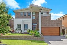  14 CHESSINGTON TERRACE BEAUMONT HILLS NSW 2155 $1,290,000-$1,375,000 Tucked away in a quiet street in Beaumont Hills, this superbly designed entertainers delight offers a luxurious lifestyle, yours for the taking! With the crystal clear pool and large covered alfresco, you will never need to go anywhere else. Set on a 451m2 block, this immaculate home showcases expansive open plan living areas, separate theatre/media room and study. A number of family parks and sporting fields, cycling and walking tracks, city buses a short walk down the road. Property features: - Grand entrance hall with high ceilings - Gorgeous kitchen boasts gas cooktop, quality stainless steel appliances and large island bench - Open plan living with huge entertainers alfresco area leading into the spacious dining and family area - Carpeted home theatre, ideal for family movie nights, plus study - Large master bedroom with open, modern ensuite and walk in wardrobe - Remaining bedrooms all with ample room, two with built in robes and one with walk in - Upstairs rumpus area with adjoining balcony - Zoned and ducted air conditioning, alarm system and rain sensing skylights - Large gas fireplace for wintertime - Inground swimming pool with solar heating - 6.5kW solar system Location benefits: - 6 minutes drive to Rouse Hill Metro and 8 minutes drive to Kellyville Metro - 1.5km from T-Way bus stop on Windsor Road, and local bus service 200m from your front doorstep! - Zoned for Ironbark Ridge Public School and Rouse Hill High School - 10 minutes drive to William Clarke College and 7 minutes drive to Rouse Hill Anglican College - 2.8 km to Rouse Hill Town Centre and 2.4km to North Kellyville Village Shops Disclaimer: This advertisement is a guide only. Whilst all information has been gathered from sources we deem to be reliable, we do not guarantee the accuracy of this information, nor do we accept responsibility for any action taken by intending purchasers in reliance on this information. No warranty can be given either by the vendors or their agents. 