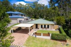  13 Picnic Pl Canungra QLD 4275 $460,000 Great Canungra Location! Great Price! This Large 5 Bedroom low-set Family home the master with ensuite with a spacious Open Plan lounge, dinning and kitchen area, with an Induction Cooker, Stainless Steel stove and Range Hood, Solar Hot Water, split system Air Conditioning. A cool rear Veranda and entertainment area, so all this located in a quiet Cul-Du-Sac, just a short walk to Canungra Township with "Tamborine Mountain High School" within this catchment area and the local Primary School, Shops, Service Stations and Post Office etc only minutes away. This is a great opportunity for the large family or an astute investor looking for a secure opportunity in a quiet Country Town, just a short 20 minutes drive to the Pacific Highway at Nerang and the Gold Coast. Please call John for more information on this unique property. 0412 571 900.   Broadband, Built In Robes, Courtyard, Deck, Dishwasher, Ensuite, Fully Fenced, Outdoor Entertaining, Pay TV, Secure Parking, Solar Hot Water, Split System AirCon, 