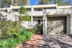  14 Gosse Street Kingston ACT 2604 $1,300,000 + Situated in one of the most sought after townhouse developments in Canberra. Architect designed by the late Bryan Dowling. Separate Title ( no body corporate). Contemporary design over 3 levels with loads of north facing natural light. Entry through the a front private courtyard which features a healthy fig tree. Very spacious open plan living room with steps up to the dining/family and sliding doors opening into a private rear garden courtyard. Original yet functional kitchen. Semi circular staircase leading up to 3 bedrooms and TV/ study mezzanine area. Large balcony off main bedroom with a treescape across to Telopea Park and the iconic Greek Orthodox Church. Single garage with auto door at the front of the property. Very short walk to the Lake , the Kingston Foreshore, Kingston Shopping Centre , the Barton precinct and the Parliamentary Triangle. This famous "Blue Dome " complex is tightly held and purchasing this townhouse is an opportunity not to be missed. Features. Separate title Contemporary design 3 levels 3 Bedrooms ( ensuite and balcony off main br) Open plan living areas Large dining area Front and rear garden courtyards North facing Garage with auto door Easy walk to Telopea Park, the lake and Kingston Shops Block size 227 sqm UV $705,000 Home size 151 sqm EER 2.5 Rates $4525 pa For inspections and more information please contact Philip Kouvelis 0412622420.. 