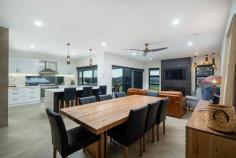  1484 Table Top Road Table Top NSW 2640 Looking for functionality, work from home, separate 2 bedroom retreat for gran or adult kids, AirBNB, or just wanting to spread out in comfort. Do not overlook this beautiful home with views to the Hume weir. Just 3yr old, this impressive family home consists of 4 bedrooms, plus a study, plus a kids games room, formal lounge and open designed family living room. Yes, there is an abundance of alternative work or living space throughout the home. The centrepiece and amazing hub of this home is the kitchen. Featuring a butlers pantry, which includes an additional oven, sink, benches, double fridge accommodation plus storage to outlast Covid lockdown. The owner, a fastidious tiler has imported slabs of marble featured splashbacks, Caesarstone benchtops, added a quality 900mm Smeg stove, dishwasher and generous natural light windows with terrific views of the countryside. He extends the luxury tiles to the intricate custom floor design not seen too often, which extends through the large meals area, family room and beyond. The family room boasts a combustion fireplace mounted on the end wall and room for a TV panel above. The large separate study offers easy access and opportunity to still work from home with doors to forget about it until the next day! In addition to the other living spaces, is something unique and somewhat flexible you're your individual requirements. The kids games room has been a 5th bedroom and can be a toy room, hobby room or a second office for that matter. The home offers town water, NBN, LPG infinity gas hot water system, reverse cycle ducted heating and cooling throughout, a double lockup garage with internal access, impressive storage throughout, separate laundry which extends out to its own covered verandah for winter drying. The main bathroom features a standalone bath, tiled to the ceiling of course, together with featured high doors throughout. The master retreat has been moved to the rear of the home in this functional home and for good reason, which includes a walk in robe, expansive en-suite also featuring a standalone spabath bathed in natural light, walk-in shower recess and hidden toilet plus a lovely view over the property and weir. An Acre block is actually 5 times the size of the new estates and this parcel, offers amazing views, has benefited from several years of establishing and landscaped for your enjoyment. They say buying a home on 5 Acres, you would be just buying yourself a mowing job every week. This is the answer. The current owners have put in tared driveways all the way to the massive shed, with dual access points to the property, established trees, gardens, retainer walls and more. If you enjoy your entertaining, the outdoor timber lined pitched alfresco dining area is located on the eastern weir side, protected from the westerly sun for your enjoyment all year around. Then there is a large shade sail for the kids toys, swing set etc protected from getting too much sunburn. Now, being a typical bloke, I think I have left the best until last, "The Shed". Now, this isn't your average shed, it surpasses that in most cases due to the sheer size. Being 15 metres deep, you can leave your tradie trailer attached each night. It is 20 metres long and three 4m doors, 4 metres high, which if you owned an excavator, you could leave it on the truck. The roof is 5m to the pitch, so it will be spacious and cool in there. The shed was a little too big, so the 4th bay was converted to a 2 bedroom unit, together with a bathroom, kitchen, its own side access and rear lane access too. There is even ducted cooling in there. Perfect for kicking the adult kids out of the main residence or inviting in in laws and their caravan to stay! Well, maybe not that far!!! This property has plenty on offer, with such a quick 10 to 15 minute drive into the city of Albury Wodonga or run the boat down to the weir for an afternoon of fishing or water skiing. This is the lifestyle you may be yearning for. The Table Top community are wonderful and have regular functions at the community hall, tennis courts, a catchup at the Ettamogah pub or volunteer at the local fire brigade. OR, just stay and enjoy this marvellous property that you can call home.  