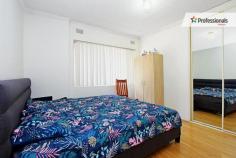  5/10 Yangoora Road Belmore NSW 2192 $440,000 - $460,000 Ideally positioned close to the popular Belmore hub, this easy-care two-bedroom unit is located on the ground floor of a well-maintained double brick block of ten. Ideal for first home buyers or as an excellent investment opportunity, this low maintenance sun-filled apartment offers a practical floor plan suitable for family living. Features include: - Two good size bedrooms, both with built-ins - Generous open lounge and dining, ideal for entertaining - Updated kitchen with ample cupboard space - Freshly painted bathroom with separate bath & shower - Tiles and floating floorboards throughout - Internal laundry - Registered carport - Moments to Belmore Boys High School, public transport and all amenities This is a comfortable unit for home buyers and investors, don’t miss this excellent opportunity!. 
