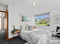  22 Stansbury Street Glenorchy TAS 7010  $415,000 This upgraded home offers street appeal, exudes charm and will catch the eye of all astute buyers. It would be the ideal addition to any portfolio, the perfect home for a first home buyer and due to the level access a must for retirees. Situated off the main street of Stansbury with stunning mountain views and extreme privacy this homely 3 bedroom property has recently had a brand new kitchen installed, is freshly painted and offers new carpets. You are able to simply move in and enjoy a life of convenience. The home where light bounces off neutral tones has incorporated great use of imagination & floor space. The beautiful kitchen provides dining space and offers easy access to the yard, it is the social heart to the generous layout. The lounge is substantially heated and the bedrooms are also a good size. The positives continue outside on this large and level lot of over 640m2 with a huge double garage and an opportunity to utilise for parking or fit out for a man-cave. The driveway offers plenty of space for extra cars, caravans and trailers. For children and pets the backyard here is secure, fully fenced, private and provides space for a trampoline, some basketball or a great space to ride bikes. The property captures excellent sun, is framed beautifully by low maintenance gardens and provides the perfect way to unwind and entertain guests. It is minutes to all transport, shopping services and conveniences. The photography only captures a small piece of the charm and feel. Opportunity to purchase quality property in the Glenorchy area is becoming increasingly rare and the home is ready for you to start enjoying immediately. Amazing house, amazing location, amazing opportunity and most of all AMAZING VALUE! Thinking of Selling? If you are curious to know the value of your home or are thinking of selling, please contact your Number 1 Agent in Australia as awarded by the Real Estate Institute of Australia and Real Estate Business Nat Downton from Downton Property for your no obligation free market appraisal. Need Finance? Buying the perfect property requires the perfect loan so give Yellow Brick Road Wealth Management Hobart a call on 03 6135 4875 or head to www.ybr.com.au/hobart to check out what the team can do for you! 