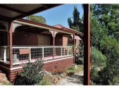  43 Inglis Street Boyup Brook WA 6244 $315,000 Located in the Heart of Boyup Brook on one of the best streets in town.Just a short walk to schools and shops.With lovely views to the North across town to the rolling farmland typical of the Blackwood Valley With nothing to spend here, this one is well worth a look This large 2 story home is constructed of;western red cedar,rammed earth & iron roof Large near new kitchen,Iots of bench space,Cupboards and pantry,gas hotplates, dishwasher,electric oven and double SS sinks. Large Air-Conditioned and heated lounge with a separate formal dining room Massive King-size main bedroom upstairs and 2 queen size bedrooms downstairs Study/office/family room and lovely refurbished bathroom. Lots of storage space under the stairs. To the rear of the property is a private entertainment area with a large spa and a beautiful water feature and a Solar hot water system The elevated front verandah gives great views over the beautifully landscaped,low maintenance front garden with views across town to the rolling hills beyond. Double concrete drive with 4 car carport,shopping door to the kitchen Rear access to a 7.5x7.5m. powered studio/workshop/garage. Low maintenance and landscaped gardens with auto reticulation.This property ticks all the boxes. Must be inspected to be believed For more information or to view please contact John Rich 0429 101 264 