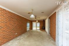  504 Webb St Lavington NSW 2641 $289,000 Located in a wonderful position near a terrific public school, sporting fields that would extend your yard for the kids and more shedding and car accommodation than normally found. This home features a large sunken loungeroom, wood fire, ducted heating and ducted cooling throughout. The kitchen includes a newer dishwasher, gas cooktop, updated electric oven and separate meals room. Directly outdoors, there is further covered entertainment and BBQ areas. The 3 bedrooms include built-in robes, with the master boasting a walk-in robe plus an en-suite. The main bathroom consists of a shower, bath, separate toilet and then there is a separate laundry too. The secure yard features several vehicle parking areas including a double lockable carport, lock up garage/workshop plus an additional carport for a caravan or trailer etc. Adding to this is a garden shed for the mower & kids bikes (maybe) so you have all the shedding for the important things in life! This home is literally a stones throw from Lavington East Public School where my 4 boys thrived over the years, there's the park, soccer fields, good public and school buses close by plus more. This home was previously leased at $280.00 pw and in the current climate, could easily be increased, especially if you do a quick upgrade of the carpet upon taking possession. Give us a call to inspect. 