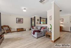  34 Gateacre Brow Onkaparinga Hills SA 5163 $515,000-$545,000 Beautifully presented inside & out this impressive family home with 4 bedrooms, 2 bathrooms, 2 living areas + study is situated on a huge 921sqm allotment in the gorgeous leafy location of Onkaparinga Hills. Offering plenty of off road vehicle parking, excellent rear yard access with double roller doors and a double gate, a triple width carport plus a double garage; this home will suit those with an active lifestyle, a tradesperson or collector of toys! Built in 1993 with progressive updates this spacious home looks & feels great. Room sizes are incredibly generous with many large windows to allow the natural light in. At the heart of the home is the modern open plan kitchen/family/dine that enjoys two private outlooks; shaded fernery on one side or pitched roof entertaining area accessed by glass sliding door on the other. This central space is a modern comfortable area where family can gather and then easily retreat for privacy when the need arises. The front of the home is host to the Living Room, Study, Bedroom 2 & the Master Bedroom with WIR & recently renovated Ensuite. The Master Bedroom also offers glass sliding door access to the shaded fernery that doubles for privacy and a very pleasant outlook. Bedrooms 3 & 4 are located to the rear of the home with large windows to overlook the manicured back yard and are serviced by the 3 way Family Bathroom. Features of the home include: • 	 Ducted evaporative air conditioning • 	 Gas heating • 	 Additional r/c split system • 	 Modern floorboards to the traffic areas • 	 Plush carpet in all 4 bedrooms • 	 Large Laundry • 	 Excellent outdoor entertaining area • 	 Triple Carport • 	 Double Garage This home has been loved & maintained yet the time has come to move on so be quick and take advantage of this opportunity to join a well established, quiet neighbourhood. For further information on this great property or to enquire on inspection times, call Deb Sorensen from Ray White Port Noarlunga on 0408 316 011. Proudly Presented by:- Ray White Port Noarlunga 2/32 Saltfleet Street, Port Noarlunga 5167 Ph: 08 8382 0029 Fax: 08 8326 1034 www.raywhiteportnoarlunga.com.au RLA 250556.. 