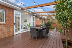  2/1 Birtles Street Balwyn VIC 3103 $1,050,000 - $1,155,000 This stylish and sophisticated single level town home newly renovated boasts sparkling designer style and modern convenience. Just a few minutes’ walk to the supermarket, cafes and city bus, this superb home is sure to impress. Located in a tree-lined enclave, it features a formal living and dining area bathed in northern sun thanks to the generous bay window. The brand-new chef’s kitchen features Caesarstone benchtops and stainless-steel appliances and overlooks an informal living zone. This immaculate abode also boasts three spacious bedrooms including a master suite with walk-in robe and ensuite. With a spacious courtyard, family bathroom with sumptuous fittings, powder room, laundry, split systems in every room, ducted heating, new flooring and double garage. Nothing to do but move in… 