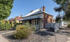  12 Edgeworth Street Prospect SA 5082 $675,000 This very appealing sandstone fronted villa residence comprises arched entry hall, 3 double bedrooms, formal living room, eat in galley style kitchen, bathroom and outside laundry. Features include polished Baltic pine floorboards, leadlight, high ceilings and original fireplaces in the 4 main rooms. This character residence has a delightful street presence, and enjoys a superb corner position which provides for great flexibility when eventually you do your North facing extension, there is lots of space in the rear yard for this. Desirably situated in highly sought Prospect and zoned for the Adelaide High Schools here is an exceptional opportunity to acquire a classic turn of the century stone fronted villa on a valuable corner site. HIGHLY RECOMMENDED.. 