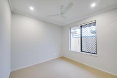  21B Grange Road Newtown QLD 4305 $419,000+ This fully turn-key brand new home is in an unbeatable location and has been tastefully designed, showcasing modern finishes throughout and a contemporary open plan footprint. The home features a premium kitchen, dazzling bathrooms, plenty of space in every room and a master suite fit for a king. This is the one you've been waiting for! Don't miss out. Property Details: - All bedrooms are carpeted and feature roller blinds, a ceiling fan and built-in wardrobes - Main bedroom also features air-conditioning, contemporary ensuite, plus a large walk-in wardrobe - Spacious, air-conditioned open plan living, kitchen and dining area; ceiling fan above the lounge area - Huge galley style kitchen with large island bench and breakfast bar, plenty of counter and cupboard space; very modern/stylish design and finishes; Caesarstone benchtops; extra-large fridge space - Kitchen appliances include an electric stove top, oven, grill, built-in microwave, retractable range hood and dishwasher - all stainless steel; existing provision for fridge water connection - Well-appointed main bathroom with bath, shower and combined ceiling extractor/heater - Internal laundry with easy access to washing line - Undercover outdoor entertainment area/patio directly accessible from the main living area of the home - Double lockup garage with remote control and internal access + side access - Modern recessed light fittings throughout the entirety of the home - New fencing - Security screens - 5.5KW solar system + additional solar hot water Move in ready - nothing more to do! Don't miss your chance to purchase this spectacular home, come and inspect the property today. Please contact the agent to arrange your inspection: 