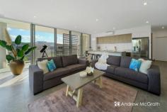  115/55E Caves Beach Road Caves Beach NSW 2281 $690,000-$750,000 Imagine falling asleep to the soothing sounds of the ocean; awakening to the gently glorious coastal sunrise as the warm dawn light pours through your floor-to-ceiling bedroom window; imagine strolling less than five-hundred meters downhill to the water's edge and knowing that this was all part of your new home. Caves Beach is an undeniable jewel in the crown that is the Australian East Coast. This opportunity to own your own slice of this oceanside paradise so close to the water for (!A LOT!) less than a million dollars is becoming a truly rare one and won't be available for long. An ultra-modern and incomparably tidy apartment. The home has been designed with an open-plan flow through the kitchen, dining and living spaces, that leads you out into the generous terrace courtyard. With both covered and open areas, including a pergola-shaded barbecue, this is perfect for al fresco dining, entertaining your guests, or just lounging in the sun. The kitchen has a large stainless steel double sink on an expansive island breakfast bar, more kitchen storage than most families need, a modern electric stove top and range hood, and enjoys abundant natural light through the oversized windows. Along with the living and dining areas, it's been designed to provide the height of convenience and comfort, with a the large island breakfast bar providing just enough separation from the living areas. The master bedroom's north-easterly aspect and shuttered floor-to-ceiling windows are perfect for enjoying the sunrise (or blocking it out for a good sleep in). With a big walk-in wardrobe that leads through to the bathroom, even the capacious storage doesn't interrupt the home's flowing design. The bathroom itself is modern and spacious, with chrome finished fixtures and stylish charcoal tiling, and serves as both a main and as an en suite to the master bed and has a large shower bay with no hob and a handheld shower head, and a large vanity and mirror. Stepping out the front door the convenience and comfort continue, with an IGA, restaurant and gelato shop all on the same block. Just across the road you'll find another cafe, Caves Beach take away, gift shop, and art gallery, and 300m down the hill you can wander into the magnificent and recently renovated Caves Beach Resort and Bistro for some casual sundowners on those balmy summer evenings by the beach, or for an award-winning Sunday lunch. This chance to own your own slice of this beachside paradise won't be available for long, so contact Andrew or Bec on (02) 4972 1066 today to find out how it can be yours! KEY FEATURES: Built-In Wardrobes Close to Schools Close to Shops Close to TransportGarden.. 