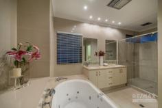  19 Tulum Approach Iluka WA 6028 Offers close 5pm 25 June 2020, the owner reserves the right to accept an offer prior to this date. Price guide in the MID 1.2mil range. Presenting the perfect blend of sophisticated design and coastal ambience. This remarkably spacious family home delivers in every aspect, including a variety of entertaining zones and open plan living that optimises natural light at every opportunity. This exquisite family home is designed to provide both sophisticated and informal retreats that facilitate contemporary coastal living. Offering an oasis of space with free flowing and relaxing modern living areas that blend effortlessly with the entertaining, dining and alfresco zones. With clever design, a functional living plan and remarkable space for the entire family, this home will exceed all of your expectations. Located in the prestigious coastal suburb of Iluka, you will discover a host of key amenities within minutes of home. Call us today for further details or plan to view this fabulous property at our next opening. Features: GROUND FLOOR • Kitchen with QStone waterfall bench-top, Blanco 900mm under bench oven, gas cook- top, Blanco range-hood, Meile dishwasher, Panasonic integrated microwave and breakfast bar • Banquet sized dining area with an alfresco outlook • Enormous central family room with feature recess ceilings & pool views • Study with built in desks, shelving and cabinetry • Home theatre with feature coffered ceilings and mood lighting • Bedrooms 2 and 3 are Queen sized with built in robes • Bedroom 4 is King sized with built in robes and Semi ensuite second bathroom • Separate powder room • Laundry with plenty of storage • Large double garage and storeroom with shoppers entrance • Mature manicured gardens with automatic reticulation • 8-metre long concrete pool with built in seating with provision for both solar and gas heating • Synthetic lawn area • Alfresco is accessed through stacked bi-fold glass doors with coffered cedar lined ceilings, ceiling fan and Jet Master fire place UPSTAIRS • Sydney Bluegum solid timber floorboards • Polished stainless steel balustrade highlight the stunning staircase • Living room with fireplace • North facing balcony with marine grade stainless steel balustrade and cedar lined ceilings • King size master suite with direct balcony access and feature ceiling • Ensuite with QStone benchtops, oval spa bath and separate toilet Additional features • LG Ducted and zoned reverse cycle air conditioning • Security alarm • Sydney Bluegum solid timber floorboards • Skirting boards and quality cornices Feature ceilings and wall recesses • 3-phase power • Data points to all bedrooms • Clay roof tiles • Built in 2012 by Trendsetter Homes • Block approx 589sqm • House approx 440sqm.. 