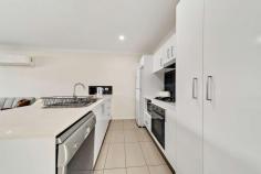  37/17 Wimmera Street Harrison ACT 2914 $485,000+ This well designed 3 bedroom townhouse is located in the convenient suburb of Harrison, minutes' drive to Gungahlin town centre. Ideally suited to a first home buyer, investor or young family, the property is very close to local shops and schools, with beautiful parks and ponds just a short stroll down the road. Set across 2 levels, the downstairs features a spacious open plan kitchen, dining and living area that opens directly onto a sunny private courtyard. The contemporary kitchen boasts stone benchtops, gas cooking and an island bench with double sink and breakfast bar. Upstairs you'll find a Master Bedroom with a walk in robe and modern 2-way bathroom which leads through to a second bedroom with a built in robe. Bedroom 3 also has a built in robe and would be perfect for use as a study or guest room. A single automatic garage with internal access offers plenty of additional storage space, while an extra car space makes visitor parking easy for friends and family. With public transport and the new light rail on your doorstep, this fabulous home delivers ultimate convenience within a modern and peaceful setting. Features: • 	 Contemporary, light-filled townhouse • 	 Ultra convenient location • 	 Open plan kitchen, dining and living • 	 Living room opens onto private courtyard • 	 Kitchen with gas cooking, stone benchtops • 	 Master Bedroom with walk in robe • 	 Ensuite-style dual access bathroom with modern fixtures • 	 2 additional bedrooms with built in robes • 	 Secure and sunny courtyard • 	 Single lockup garage • 	 Extra car space • 	 Directly opposite school • 	 Minutes' walk to light rail, shops, restaurants, gyms and parks • 	 Currently rented at $520 per week on a month to month lease Stats: Build: 2014 Ground: 43m2 Upper: 38m2 Garage: 20m2 Body Corp: $531.30 pq Rates: $1,534.48 pa Land tax: $1,766.12 pa EER: 6.0 FEATURES: • 	 Air Conditioning • 	 Built-In Wardrobes • 	 Close To Schools • 	 Close To Shops • 	 Close To Transport • 	 Secure Parking.. 