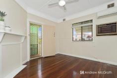  9 Galgabba Street Swansea NSW 2281 $550,000-$595,000 A gorgeous classic cottage on a flat block in the much sought-after Swansea North. Get in touch soon because this one won't be available for long! REAR LANE ACCESS via Neale Ln to a spacious double-doored garage; immaculate easy-care gardens complimented by two covered, multi-purpose al fresco areas; a great foundation with shedloads of potential!? This is as perfect a first home as it would be forever home or investment project! Guests are welcomed by a well-kept front lawn and enter, via the fenced yard, through the covered, elevated porch to the spacious living room with polished timber floor boards. TV point and air conditioning make sure you'll always find comfort in here all year round. Through to the classic central kitchen complete with a double stainless steel sink, solid timber bench tops and built-in cupboards and laminate cabinetry. Thanks to the space, ample bench tops and simple layout, every culinary experience here a pleasure, whether you're cooking up a storm or just making a cuppa. To the rear of the home, the dining room, which has the space to be as versatile as you'd need it to be, offers views of and access to the backyard. Ideal for catch-ups with friends and lazy weekends. Step from here into the backyard's two adjacent covered entertaining areas or beyond into the bright and and you'll know this is the home for you! Bedrooms both enjoy ample sunlight through good-sized windows, with bedroom 1 sporting a large upright wardrobe, and both are close to the bright, well-appointed and very practical bathroom. All practicalities aside, this home's location is itself the ultimate added extra. It provides quick and easy access to every leisure whim and necessity available in the area. Just minutes from Swansea's main street shops, a short walk from Chapman Oval, Swansea skate park, and the beautiful Swansea Channel foreshore, and barely a five minute drive from the pristine and patrolled shores and waters of Blacksmiths and Caves Beaches. Get in touch with Bec or Andrew on (02) 4972 1066 to find out more! KEY FEATURES: Close to Schools Close to Shops Close to Transport Garden Separate Dining.. 