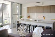  115/55E Caves Beach Road Caves Beach NSW 2281 $690,000-$750,000 Imagine falling asleep to the soothing sounds of the ocean; awakening to the gently glorious coastal sunrise as the warm dawn light pours through your floor-to-ceiling bedroom window; imagine strolling less than five-hundred meters downhill to the water's edge and knowing that this was all part of your new home. Caves Beach is an undeniable jewel in the crown that is the Australian East Coast. This opportunity to own your own slice of this oceanside paradise so close to the water for (!A LOT!) less than a million dollars is becoming a truly rare one and won't be available for long. An ultra-modern and incomparably tidy apartment. The home has been designed with an open-plan flow through the kitchen, dining and living spaces, that leads you out into the generous terrace courtyard. With both covered and open areas, including a pergola-shaded barbecue, this is perfect for al fresco dining, entertaining your guests, or just lounging in the sun. The kitchen has a large stainless steel double sink on an expansive island breakfast bar, more kitchen storage than most families need, a modern electric stove top and range hood, and enjoys abundant natural light through the oversized windows. Along with the living and dining areas, it's been designed to provide the height of convenience and comfort, with a the large island breakfast bar providing just enough separation from the living areas. The master bedroom's north-easterly aspect and shuttered floor-to-ceiling windows are perfect for enjoying the sunrise (or blocking it out for a good sleep in). With a big walk-in wardrobe that leads through to the bathroom, even the capacious storage doesn't interrupt the home's flowing design. The bathroom itself is modern and spacious, with chrome finished fixtures and stylish charcoal tiling, and serves as both a main and as an en suite to the master bed and has a large shower bay with no hob and a handheld shower head, and a large vanity and mirror. Stepping out the front door the convenience and comfort continue, with an IGA, restaurant and gelato shop all on the same block. Just across the road you'll find another cafe, Caves Beach take away, gift shop, and art gallery, and 300m down the hill you can wander into the magnificent and recently renovated Caves Beach Resort and Bistro for some casual sundowners on those balmy summer evenings by the beach, or for an award-winning Sunday lunch. This chance to own your own slice of this beachside paradise won't be available for long, so contact Andrew or Bec on (02) 4972 1066 today to find out how it can be yours! KEY FEATURES: Built-In Wardrobes Close to Schools Close to Shops Close to TransportGarden.. 