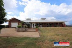  4 Heinecke Lane Tumbarumba NSW 2653  $590,000 Here's one that surely tickles the taste buds! Nested high on the hill with outstanding views over the township Eye pleasing from the outside - quality on the inside Welcoming entrance foyer Tiled living areas Kitchen with Tasmanian Black Wood cupboards and granite bench tops Natural light from the extended high set skylights Main bedroom with ensuite, all bedroom with built in's + ceiling fans Storage room + office space 3 bathrooms in total! Kitchen, dining & living + formal lounge room Reverse cycle + 2 wood fire places And that's just the inside ... Huge yard of 6739m2 (1.6 acres) Entertaining area overlooking the in-ground pool 5 garages in total (3 bay + 2 x single attached to the home) Double wood shed with slide top roof for easy access.. 