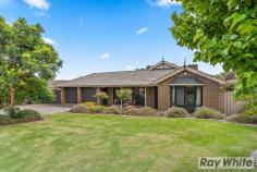  34 Gateacre Brow Onkaparinga Hills SA 5163 $515,000-$545,000 Beautifully presented inside & out this impressive family home with 4 bedrooms, 2 bathrooms, 2 living areas + study is situated on a huge 921sqm allotment in the gorgeous leafy location of Onkaparinga Hills. Offering plenty of off road vehicle parking, excellent rear yard access with double roller doors and a double gate, a triple width carport plus a double garage; this home will suit those with an active lifestyle, a tradesperson or collector of toys! Built in 1993 with progressive updates this spacious home looks & feels great. Room sizes are incredibly generous with many large windows to allow the natural light in. At the heart of the home is the modern open plan kitchen/family/dine that enjoys two private outlooks; shaded fernery on one side or pitched roof entertaining area accessed by glass sliding door on the other. This central space is a modern comfortable area where family can gather and then easily retreat for privacy when the need arises. The front of the home is host to the Living Room, Study, Bedroom 2 & the Master Bedroom with WIR & recently renovated Ensuite. The Master Bedroom also offers glass sliding door access to the shaded fernery that doubles for privacy and a very pleasant outlook. Bedrooms 3 & 4 are located to the rear of the home with large windows to overlook the manicured back yard and are serviced by the 3 way Family Bathroom. Features of the home include: • 	 Ducted evaporative air conditioning • 	 Gas heating • 	 Additional r/c split system • 	 Modern floorboards to the traffic areas • 	 Plush carpet in all 4 bedrooms • 	 Large Laundry • 	 Excellent outdoor entertaining area • 	 Triple Carport • 	 Double Garage This home has been loved & maintained yet the time has come to move on so be quick and take advantage of this opportunity to join a well established, quiet neighbourhood. For further information on this great property or to enquire on inspection times, call Deb Sorensen from Ray White Port Noarlunga on 0408 316 011. Proudly Presented by:- Ray White Port Noarlunga 2/32 Saltfleet Street, Port Noarlunga 5167 Ph: 08 8382 0029 Fax: 08 8326 1034 www.raywhiteportnoarlunga.com.au RLA 250556.. 