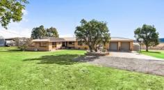  426 Drayton Connection Road Finnie QLD 4350 Knock knock knocking on the cities doorstep allowing the use of acreage living whilst not sacrificing city conveniences including schools, medical and shopping. Massive well maintained and presented brick family home with room for everyone. 4 large built-in bedrooms, office, updated kitchen and bathroom and multiple living spaces across a very functional floor plan. Suited to racing or pleasure horses with 4 paddocks with electric fencing, 5 stables, round yard, day yard, vet crush, horse walker and wash bay established on the property. Other improvements include 3 bay colourbond shed and 9x9 shed with extra height for a truck. There is a stock and domestic bore plus 20 000 gallons of rainwater. 3 phase power plus 5 kw solar system and 2 driveways service the property . This is premier acreage living in all regards with its location, features, potential and will have appeal with a wide range of buyers some being those with trucks, machinery, horse interests or those looking to live with some space around them while looking at the bright lights of Toowoomba. A must see property offering a rare and exciting opportunity as not many of them come on to the market.. 