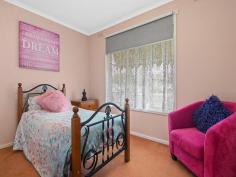  20 CARPENTER STREET WENDOUREE VIC 3355 $349,000 - $359,000 A much loved home in one of Wendouree most popular pockets, just a short walk to Forest Street Primary School or Mount Rowan Secondary College, and a short drive to major shopping centre Stockland Wendouree. Whether you're a first home buyers, investor, or downsizer this home will impress the fussiest of buyers. Immaculately maintained over the years, this solid brick veneer home boasts a familiar floorplan. 3 bedrooms with built in robes are generous in size and positioned off the hallway. The family bathroom offers a separate shower and bath, and is handy to all bedrooms. The kitchen has been updated, with electric stove and plenty of bench space to work with. Gas heating and split system heating and cooling keep you comfortable all year round. Long driveway leads you down to the oversize brick double garage. Sunblinds offer protection to the west facing facade of the home, and you'll enjoy well established gardens. All set on a spacious allotment of approximately 607m2… 