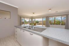  2 Poseidon Way Glenfield WA 6532 $443,000 This charming home is so well located with the beach being less than 200 metres the park 50 metres and the bus stop even closer at 20 metres 2 Poseidon Way has been tastefully decorated in beachy colours and boasts a large open plan kitchen, great flow from dining out to alfresco with plenty of seating and easy care gardens with fruit trees, and expansive sea views to the northwest. It's north facing aspect means you will get the full benefit of warming winter sun. The bedrooms are a generous size size, all carpeted and all with 12kw ducted air-conditioning. There is even the added bonus of a study nook off the kitchen with lots of room to spread out. There is plenty of room in the garage to store the man toys, and it has access to the back yard. Another very welcome feature is an outside shower, so you can wash off the kids and the dog after that refreshing ocean swim! Please call Janette Brennan on 0417 091 665 to view this amazing property. Property Features: • 	 580sqm block • 	 Easy care raised garden beds • 	 Constructed early 2014 • 	 Access to back yard through garage • 	 3.1m high ceilings • 	 Large corner pantry • 	 excellent window treatments • 	 4 stn Auto reticulation system • 	 Water rates: (for period 01/07/2019 to 30/06/2020) - $1,463.15 • 	 Council rates: $2,650.00 FEATURES: • 	 Air Conditioning • 	 Built-In Wardrobes • 	 Close To Schools • 	 Close To Shops • 	 Close To Transport • 	 Garden.. 