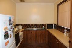  3/410 Kotthoff St Lavington NSW 2641 $169,000 *Whether you are looking for an investment or your first home, look at this comfortable spacious unit in a convenient central Lavington location. * Offering practical accommodation with 2 bedrooms each with built-in-robes and open plan living. * Large kitchen with ample storage, gas heating and wall air-conditioner. * Full bathroom, separate laundry, single lock-up garage with remote, side yard access. * Currently tenanted to a long-term tenant, the perfect property for the investor. If you are thinking of buying or investing for the first time in a good area located in central Lavington close to all shops and public transport, or just walk to the shopping centre, then this is the one. 