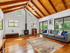  394 MOUNTAIN VIEW ROAD MALENY QLD 4552  $795,000 ucked privately away on an easy-care, one-acre parcel of land, this outstandingly presented home offers the perfect mix of classic character features with contemporary conveniences. Situated in the popular Mountain View Road area and only 3 kilometres east of Maleny, with walking and cycling paths to Mary Cairncross Park, nearby restaurants and into town, this property offers the ideal country lifestyle. The fully refurbished and freshly painted home provides our most sought-after criteria: - An expansive, open-plan living / dining / kitchen area with soaring ceiling - New Guinea Rosewood kitchen with quality appliances and stone benchtops - Most rooms flowing onto rambling, wrap-around verandahs - 3 spacious bedrooms, all with built-ins plus separate office / nursery room - 2 new and smartly appointed bathrooms - Artist studio / rumpus / home office and double lockup garage to lower level of house. Add to all this: a high level of privacy, the charming gardens, the stunning timber floors throughout and you have ticked all the most-popular boxes! 