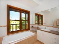  154 ENGLE ROAD REESVILLE QLD 4552 $1,300,000 ombining 34 acres of Land for Wildlife native Australian forest, walking tracks and a beautifully presented 12 year old Chalet Style home, this property meets the brief for privacy, tranquility and nature while also delighting the future buyer with a generously proportioned home. The land area on offer is noted for its significant Native Vegetation and therefore we believe the future buyer will have a keen desire to continue protecting this amazing natural resource. Enjoy the sounds from an array of birdlife and expect regular visits from the King Parrots. Your forest is also home to the Potoroo, with the site being recognised by Council as an important habitat for the preservation of this little animal. Well established walking tracks will take you on a circuit of the property and provide easy access for nature watching and general maintenance. Designed to bring the stunning environment close to the home, soaring cathedral ceilings are beautifully enhanced with window glazing to most of the north facing side of the home. On a moonlit night, you will enjoy the light filtering through the trees and in winter, the warming sun. The lower level of the home includes an entry hall, 3 bedrooms, main bathroom, laundry, well-appointed large kitchen and an open plan lounge / dining area which extends out to the front and rear verandahs. The upper level of the home provides a deluxe master suite with 2nd living area, main bedroom, walk-in robe, ensuite and verandah. Each of the rooms throughout the home are generously proportioned and with high ceilings, provide a luxurious sense of space. One of the outstanding aspects of this property is the gentle nature of the land. The parcel around the residence is near level, while the open space cow paddock and spring fed dam are all easily accessed and very user friendly. The property has an abundance of water with 45,000 litres collected from the home and a reliable bore reticulated to various parts of the property. Storage and workshop space should be ample with a double garage, double carport and a 9m x 6m shed. You may also wish to consider further development and build a few cottages. This property would offer the most outstanding eco style holiday stay if you were to obtain planning approvals for a number of cabins. This is an exciting opportunity to explore in so many ways. Secure your own outstanding slice of the Hinterland today! ** All information contained herein is gathered from sources we believe to be reliable. However, we cannot guarantee its accuracy and interested persons should rely on their own enquiries. 
